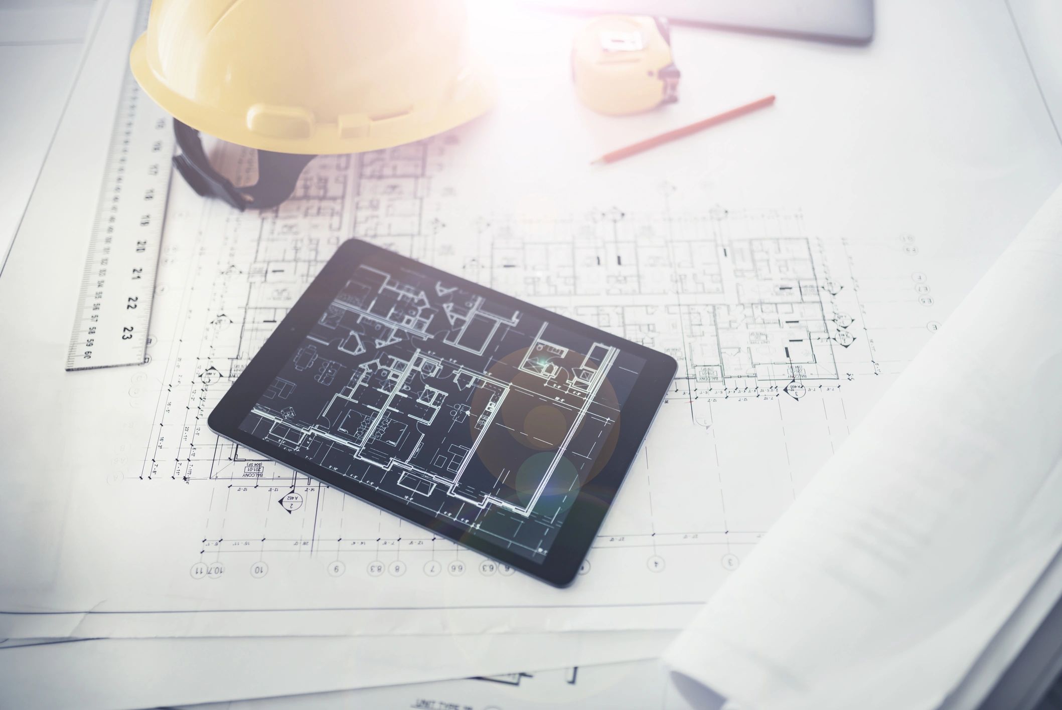 Architectural plan on a tablet showing engineering drawings